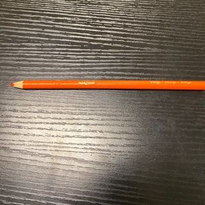 Orange pencil used lightly it has been through a lot